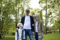 White Caucasian Family. Mother, Father, Little Boy Walk In Park, Enjoying Time Together Royalty Free Stock Photo