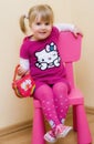 White caucasian girl in Hello Kitty outfit