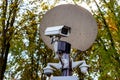 White CCTV security cameras in the city street park. Royalty Free Stock Photo