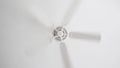 White ceiling electrical fan in motion