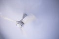 White ceiling fan on a white ceiling Royalty Free Stock Photo