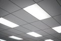 White ceiling with neon light bulbs in uprisen view Royalty Free Stock Photo