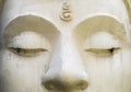 White cement Buddha image face Royalty Free Stock Photo