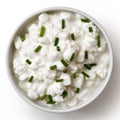 White ceramic bowl of chunky cottage cheese garnished with chive Royalty Free Stock Photo