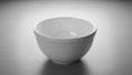 Positioned against a neutral gray gradient background, the bowl has Royalty Free Stock Photo