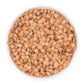 White ceramic bowl of green uncooked lentils