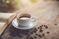 White ceramic coffee cup of black hot americano on wooden table Royalty Free Stock Photo