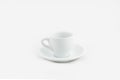 White ceramic coffee cup on a saucer isolated on a white background Royalty Free Stock Photo