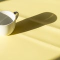 Contrast, highlighting the smooth texture of the cup and the subtle Royalty Free Stock Photo