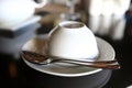 White ceramic cup and teaspoon Royalty Free Stock Photo