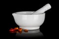 White ceramic mortar with dried chili peppers Royalty Free Stock Photo