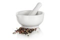 White ceramic mortar with pepper Royalty Free Stock Photo