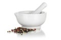 White ceramic mortar with pepper Royalty Free Stock Photo