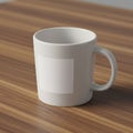 White ceramic mug with a blank square label on a wooden surface. The mug features Royalty Free Stock Photo
