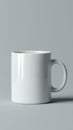 White ceramic mug on gray background with soft shadow Royalty Free Stock Photo