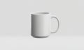 White Ceramic Mug on Isolated Plain Background, Simple Clean Design, Studio Lighting, Neutral Tone Royalty Free Stock Photo