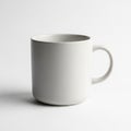 White ceramic mug with a simple cylindrical shape and a smoothly Royalty Free Stock Photo