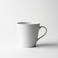 Ceramic mug with a simple design and a smooth surface sits against a Royalty Free Stock Photo