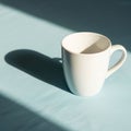 The mug s handle is on the right side, casting a distinct shadow to the left Royalty Free Stock Photo