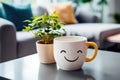 White ceramic mug with a smiley face on the table against the background of the sofa in the living room. Have a good start to the