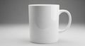 White ceramic mug with a smooth, glossy surface and a cylindrical shape. It has a rounded handle Royalty Free Stock Photo
