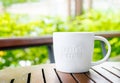 White ceramic mug with stamp word Royalty Free Stock Photo