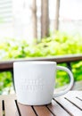 White ceramic mug with stamp word Royalty Free Stock Photo