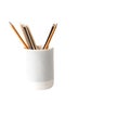 White ceramic pencil holder with sharpened pencils container Royalty Free Stock Photo