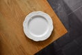 Minimalist Decorative Plate on Rustic Wood Table Royalty Free Stock Photo