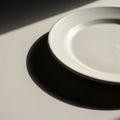 White ceramic plate placed on a Royalty Free Stock Photo