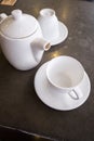 White ceramic tea pot ,cups and saucers Royalty Free Stock Photo