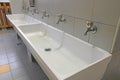 white ceramic washbasin of a school