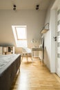 White chair at desk with lamp in home office interior in the att Royalty Free Stock Photo