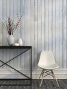 White chair and metal table against the wall of white boards