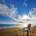 White chair stay on seandy sea beach at the early morning Royalty Free Stock Photo