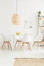 White chairs in bright room