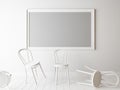 White chairs and empty frame in a room