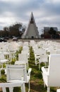 White chairs in front of 'Cardboard Cathedral, Christchurch Royalty Free Stock Photo