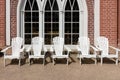 White chairs to rest in front of the villa