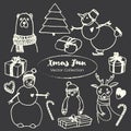 White chalk Christmas doodles set on blackboard with deer with scarf, Christmas tree, candy, bear, cakes, toys, gifts