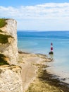 White chalk cliffs and Beachy Head Lighthouse Royalty Free Stock Photo
