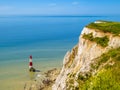 White chalk cliffs and Beachy Head Lighthouse, Eastbourne, East Sussex, England Royalty Free Stock Photo