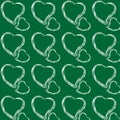 White chalk different size hearts on a green background Royalty Free Stock Photo