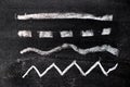 White chalk hand drawing in set of line shape on blackboard background