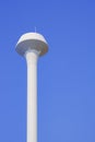 White champagne tower tank against blue clear sky background Royalty Free Stock Photo