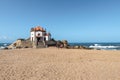 White chapel on the beach in Vila Nova de Gaia, Portugal on a sunny day