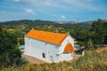 White chapel and mountains, Crete Island, Greece Royalty Free Stock Photo