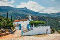 White chapel and mountains, Crete Island, Greece Royalty Free Stock Photo