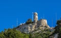 White Chapel of Saint George on Mont Lykabettos with blue sky, Athens