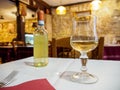 White Chardonnay Wine at Italian Restaurant, Paris, France Royalty Free Stock Photo